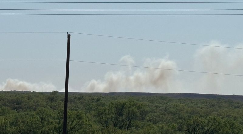 Smoke from the Amarillo city landfill fire is seen Sunday, May 17 to the west of Amarillo, off SL 335.