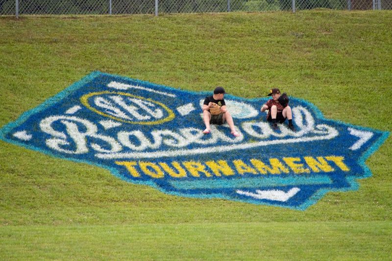 May 24, 2022; Hoover, AL, USA; Kids sit on the SEC logo along the left field line as Alabama faced Georgia in game one of the SEC Tournament at Hoover Met. Mandatory Credit: Gary Cosby Jr.-The Tuscaloosa News

Ncaa Baseball Sec Baseball Tournament Alabama Crimson Tide At Georgia Bulldogs