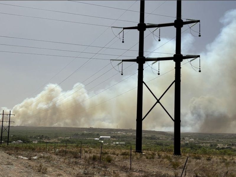 Billowing smoke could be seen Monday, May 18, after the Amarillo city landfill fire spread into neighborhoods and destroyed homes during strong winds.