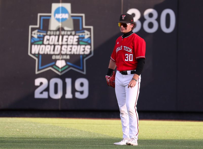 Texas Tech's Jesse Rusinek stands in the outfield during a non-conference Division I baseball game, Tuesday, March 31, 2026, at Rip Griffin Park.