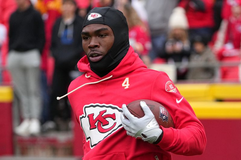 Nov 23, 2025; Kansas City, Missouri, USA; Kansas City Chiefs wide receiver Rashee Rice (4) warms up before the game against the Indianapolis Colts at GEHA Field at Arrowhead Stadium.