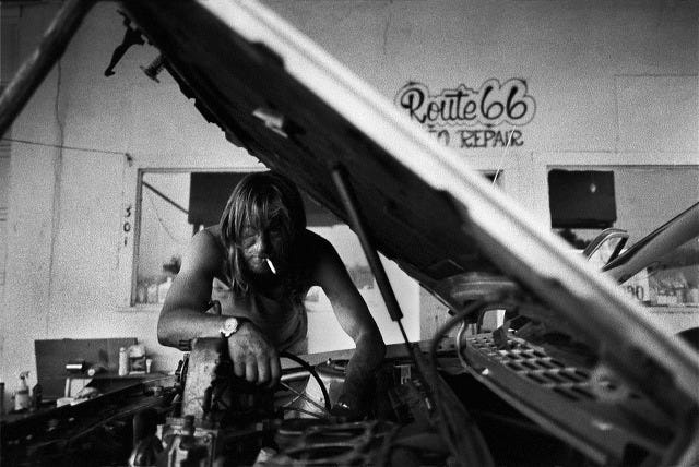 "Car Mechanic," by Ed Keating. "Main Street: The Lost Dream of Route 66," an exhibit featuring the work of the late, Pulitzer Prize-winning photographer, is on display at the Amarillo Museum of Art now through Aug. 16.