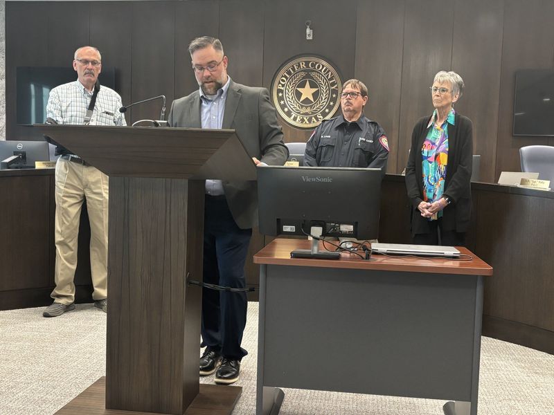 On Wednesday evening, May 20, a somber group of Amarillo leaders gathered at the Potter County Courthouse chambers to deliver the news that 52 homes were destroyed in the recent fires around Bishop Estates, Bishop Hills and other neighborhoods in a historic loss for the area. At front is Max Dunlap, director with the Amarillo Office of Emergency Management, back row, from left, Potter County Sheriff Brian Thomas, Potter County Fire Chief Richard Lake and Potter County Judge Nancy Tanner.