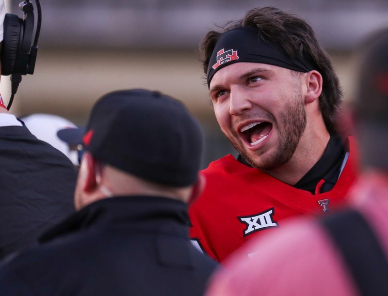 Texas Tech's Brendan Sorsby talks to coaches during the spring football game, Friday, April 17, 2026, at Jones AT&T Stadium.