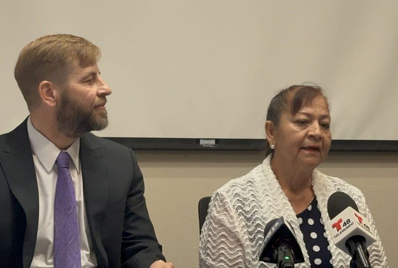 Lorena Vargas, right, and her attorney, Wayne Krause Yang, discuss a lawsuit they filed against alleged scammers who claimed she owed $100,000 on a loan for solar panels. Vargas spoke at a news conference on Wednesday, May 20, 2026, at the Texas Rio Grande Legal Aid office in South El Paso.