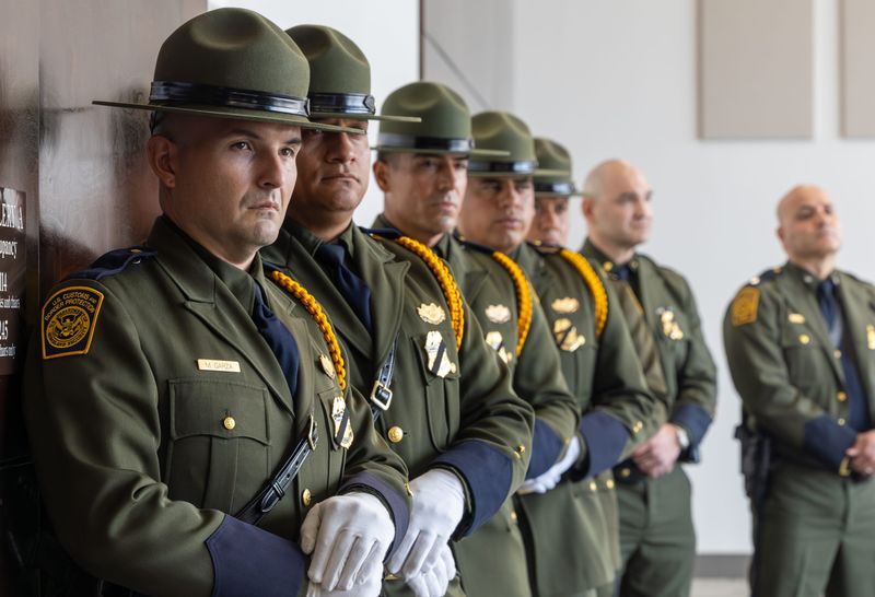 Agents stand in silence during the National Memorial Service hosted by the U.S. Border Patrol El Paso Sector May 21, 2026, at the SISD Student Activities Complex.