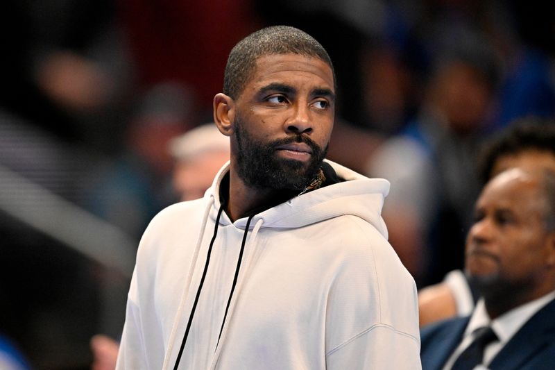Nov 14, 2025; Dallas, Texas, USA; Dallas Mavericks guard Kyrie Irving looks on during the second half against the LA Clippers in an NBA Cup game at the American Airlines Center. Mandatory Credit: Jerome Miron-Imagn Images