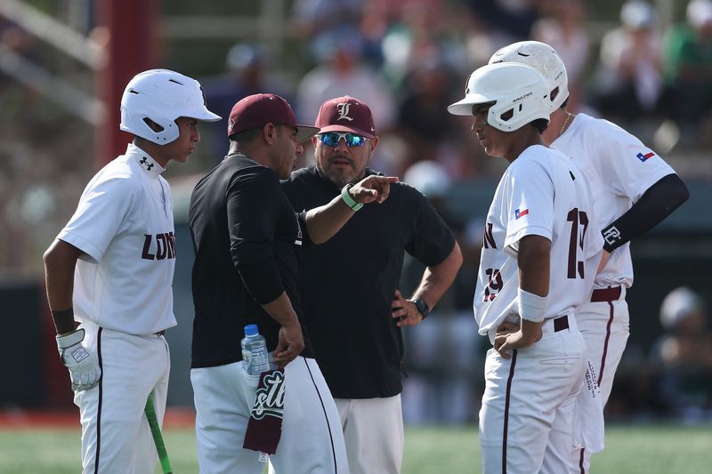 London talks strategy during a Falfurrias pitching change during Game 2 of the Region IV-3A Division I final series at Robstown's Steve Castro Field on Friday, May 22, 2026.