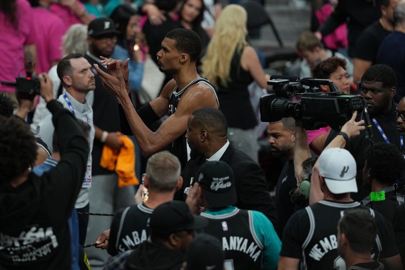 May 22, 2026; San Antonio, Texas, USA; San Antonio Spurs forward Victor Wembanyama (1) reacts after game three of the western conference finals for the 2026 NBA playoffs at Frost Bank Center. Mandatory Credit: Daniel Dunn-Imagn Images