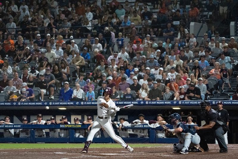 Texas A&M Aggies' Jake Duer (3) swings at the ball as Auburn Tigers take on Texas A&M Aggies during the SEC baseball tournament at Hoover Metropolitan Stadium at Legacy Arena in Hoover, Ala. on Friday, May 22, 2026.
