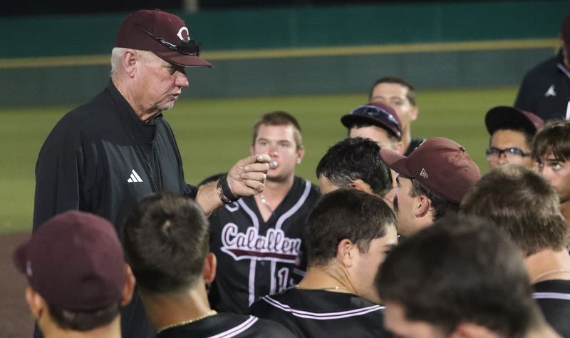 Calallen head baseball coach Steve Chapman talks to the Wildcats after defeating Davenport in Game 2 of the Class 4A Division I regional final on Friday, May 22, 2026, at Cabaniss Baseball Field in Corpus Christi.