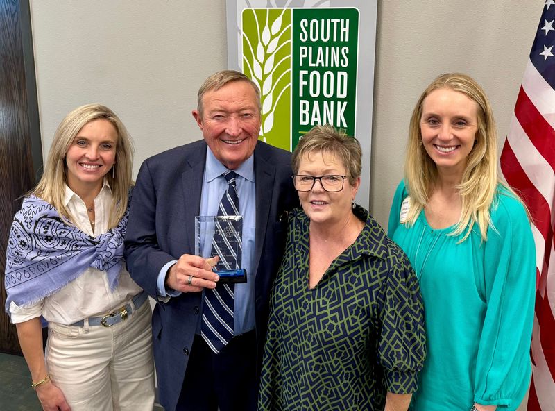 Former Lubbock Mayor David Langston holds his Diekemper Service Above Self Award with (from left) Saskia Bergstein Allen, Ronda Langston and Kara Bergstein D’Alise. Allen and D’Alise represented the Diekemper family at the Rotary Club of Lubbock’s annual Diekemper Luncheon, benefitting the South Plains Food Bank in April 2026.