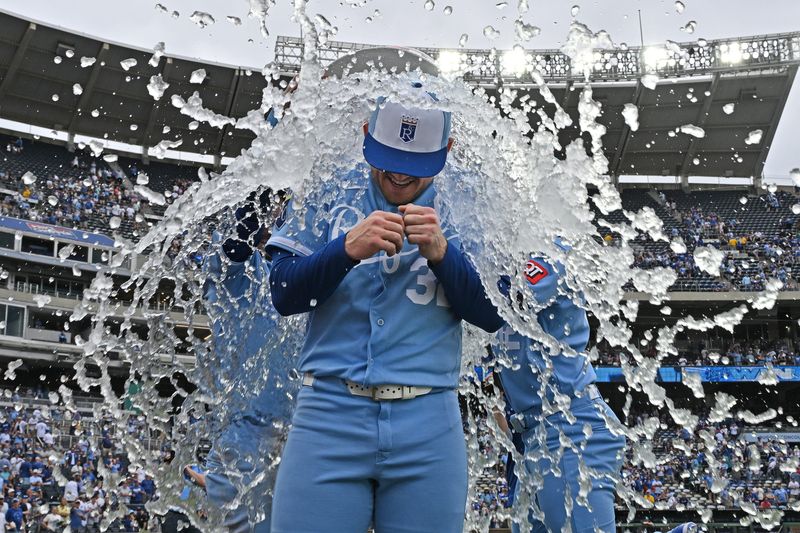 May 23, 2026; Kansas City, Missouri, USA; Kansas City Royals starting pitcher Stephen Kolek (32) gets dunked with ice water after throwing a complete game shutout to beat the Seattle Mariners at Kauffman Stadium. Mandatory Credit: Peter Aiken-Imagn Images