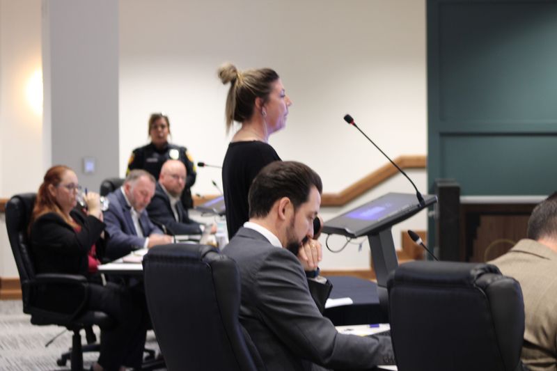 Carrie Homer explains the Amarillo landfill trash situation, which has only gotten worse, despite hundreds of phone calls made to resolve the problem that were not answered, during Amarillo City Council's meeting on Tuesday, May 26.
