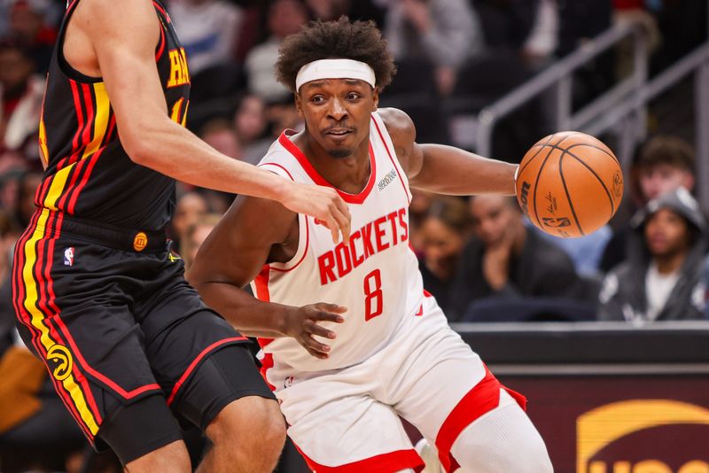 Jan 29, 2026; Atlanta, Georgia, USA; Houston Rockets forward Jae'sean Tate (8) drives to the basket against the Atlanta Hawks in the fourth quarter at State Farm Arena. Mandatory Credit: Brett Davis-Imagn Images