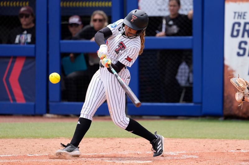 Texas Tech Red Raiders outfielder Mihyia Davis (42) drives in a run in the fifth inning of a Women's College World Series softball game between the Texas Tech Red Raiders and the Mississippi State Bulldogs at Devon Park in Oklahoma City, Thursday, May 28, 2026. Texas Tech won 8-0.