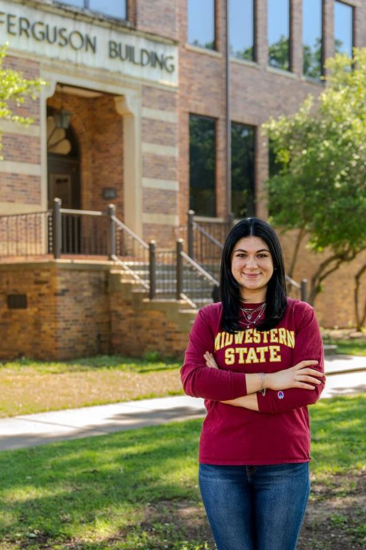 Cristin Martin poses for a phot on May 15, 2026. She honored her father by completing a degree at Midwestern State University.
