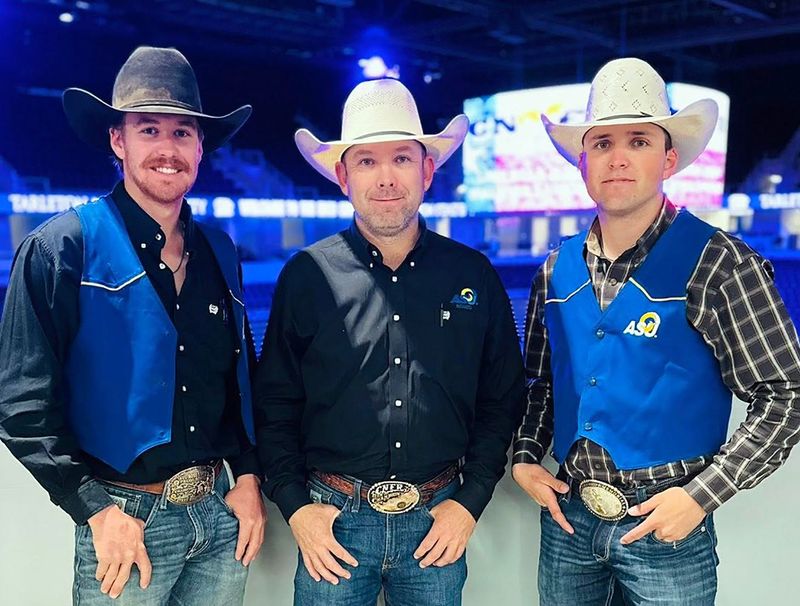 Angelo State University rodeo athletes Caleb Lake and Sam Lewis stand beside their coach Casey Sisk (center) April 20. Lake and Lewis have qualified for national finals events next month. A third, Logan Yarbrough, will compete Saturday in Abilene at the National Finals Steer Roping-College Division.