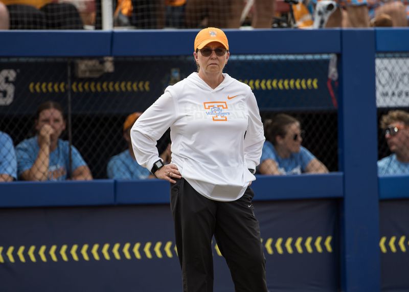 May 30, 2026; Oklahoma City, OK, USA; Tennessee Lady Volunteers head coach Karen Weekly looks on in the third inning against the Texas Tech Red Raiders during the NCAA Women’s College World Series at Devon Park. Mandatory Credit: Brett Rojo-Imagn Images
