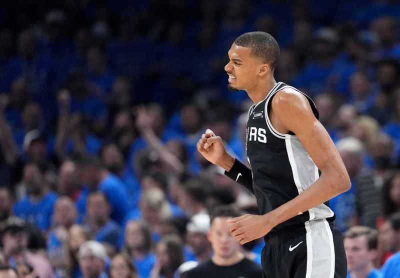 San Antonio's Victor Wembanyama (1) reacts after a 3-point basket Game 7 of the Western Conference Finals in the NBA playoffs between the Oklahoma City Thunder and the San Antonio Spurs at Paycom Center in Oklahoma City, May 30, 2026.