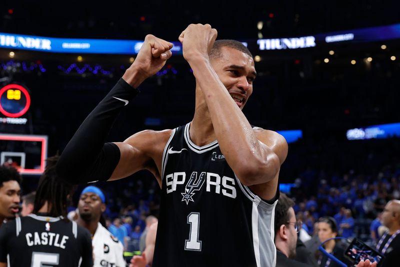 May 30, 2026; Oklahoma City, Oklahoma, USA; San Antonio Spurs forward Victor Wembanyama (1) celebrates after defeating the Oklahoma City Thunder in game seven of the western conference finals for the 2026 NBA playoffs at Paycom Center.