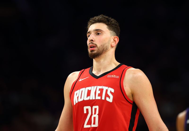 Apr 7, 2026; Phoenix, Arizona, USA; Houston Rockets center Alperen Sengun (28) against the Phoenix Suns at Mortgage Matchup Center. Mandatory Credit: Mark J. Rebilas-Imagn Images