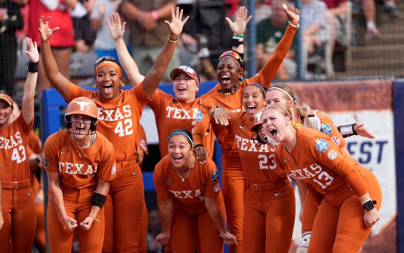 Texas celebrates the home run on Kaiah Altmeyer (44) in the second inning during a Women's College World Series softball game between the Mississippi State Bulldogs and the Texas Longhorns at Devon Park in Oklahoma City, May 29, 2026.