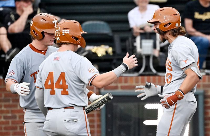 Texasâ€™ Aiden Robbins (43) celebrates with teammates after hitting his second home run of the game against Vanderbilt during the fourth inning of a NCAA baseball game at Hawkins Field on Friday, April 24, 2026, in Nashville, Tenn.