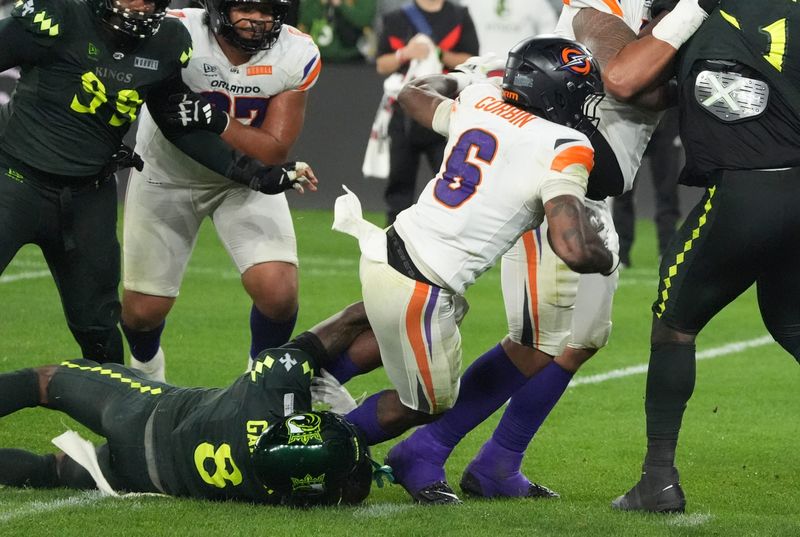 Louisville Kings' Mekhi Garner tackles Orlando Storm's Jashaun Corbin at Lynn Family Stadium on April 10, 2026.