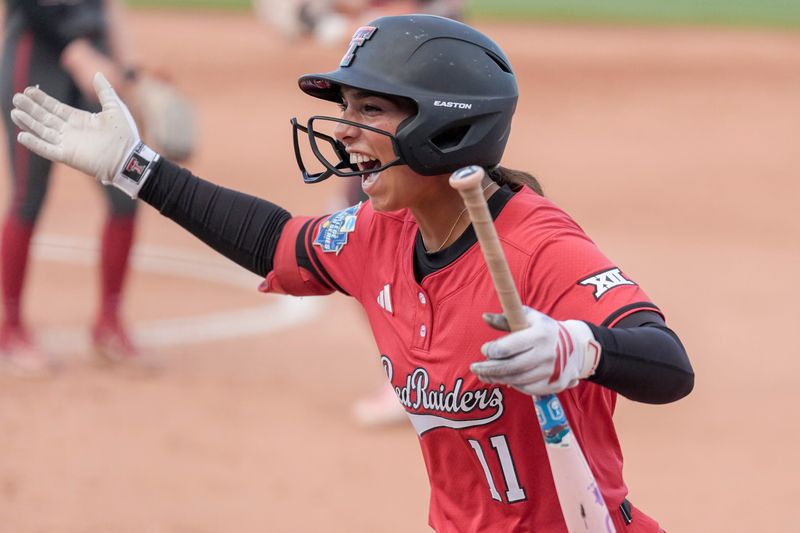 Texas Tech infielder Lauren Allred (11) celebrates hitting a home run in the second inning during a softball game at the Women’s College World Series between Texas Tech and Alabama at Devon Park in Oklahoma City, on Monday, June 1, 2026.