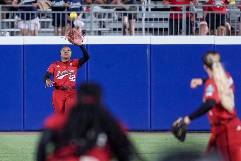 Texas Tech outfielder Mihyia Davis (42) catches a ball hit to the outfield in the first inning of the second softball game between Texas Tech and Alabama at the Women’s College World Series at Devon Park in Oklahoma City, on Monday, June 1, 2026.