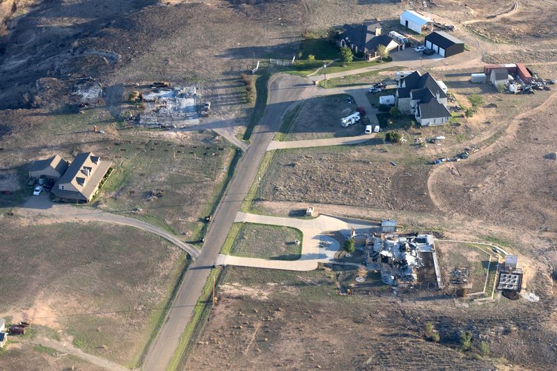 On June 1, two weeks after the Stinky Fire and landfill fire, which burned from May 17 to May 21, you can still see the damage as residents continue to recover from losses. The two houses pictured were first shown in photos by Neil on May 19.
