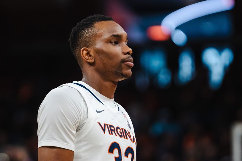 Feb 7, 2026; Charlottesville, Virginia, USA; Virginia Cavaliers center Ugonna Onyenso (33) looks on during the second half against the Syracuse Orange at John Paul Jones Arena. Mandatory Credit: Emily Faith Morgan-Imagn Images