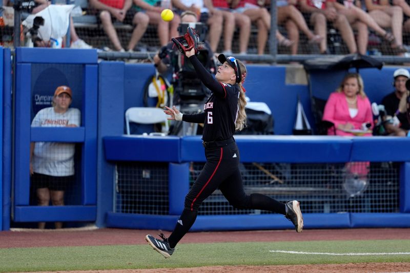 Texas Tech Red Raiders third baseman Taylor Pannell (6) catches the ball for an out in the third inning of Game 1 of the NCAA softball Women's College World Series finals between the Texas Longhorns and the Texas Tech Red Raiders at Devon Park in Oklahoma City, Wednesday, June 3, 2026.