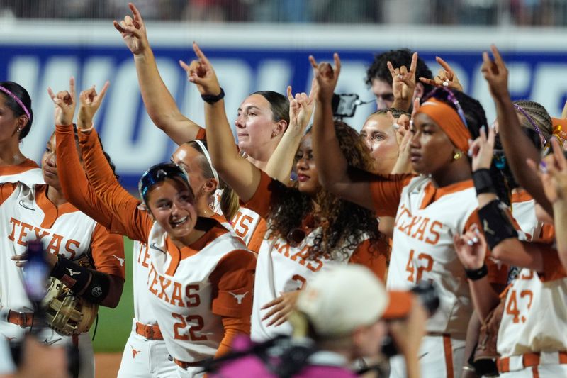 Texas Longhorns pitcher Teagan Kavan (17) celebrates with teammates after Game 1 of the NCAA softball Women's College World Series finals between the Texas Longhorns and the Texas Tech Red Raiders at Devon Park in Oklahoma City, Wednesday, June 3, 2026.