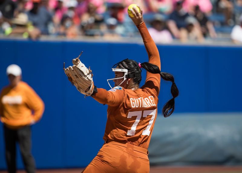Jun 1, 2026; Oklahoma City, OK, USA; Texas Longhorns pitcher Citlaly Gutierrez (77) throws a pitch in the first inning against the Tennessee Lady Volunteers during the NCAA Women’s College World Series at Devon Park. Mandatory Credit: Brett Rojo-Imagn Images