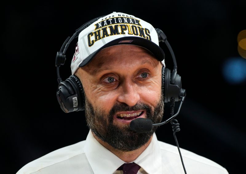 Dec 21, 2025; Kansas City, MO, USA; Texas A&M Aggies head coach Jamie Morrison is interviewed after winning the 2025 NCAA Women’s Volleyball Championship against the Kentucky Wildcats at T-Mobile Center. Mandatory Credit: Jay Biggerstaff-Imagn Images