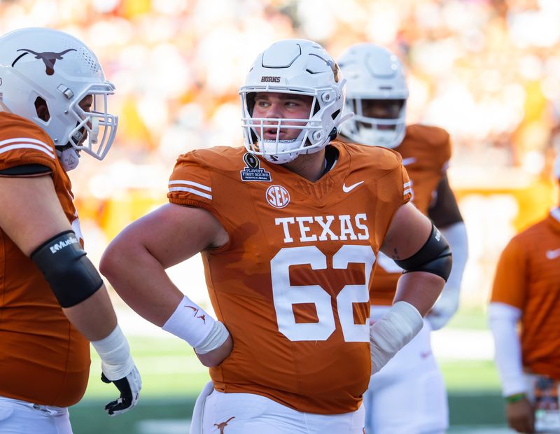 Dec 21, 2024; Austin, Texas, USA; Texas Longhorns offensive lineman Connor Robertson (62) against the Clemson Tigers during the CFP National playoff first round at Darrell K Royal-Texas Memorial Stadium. Mandatory Credit: Mark J. Rebilas-Imagn Images