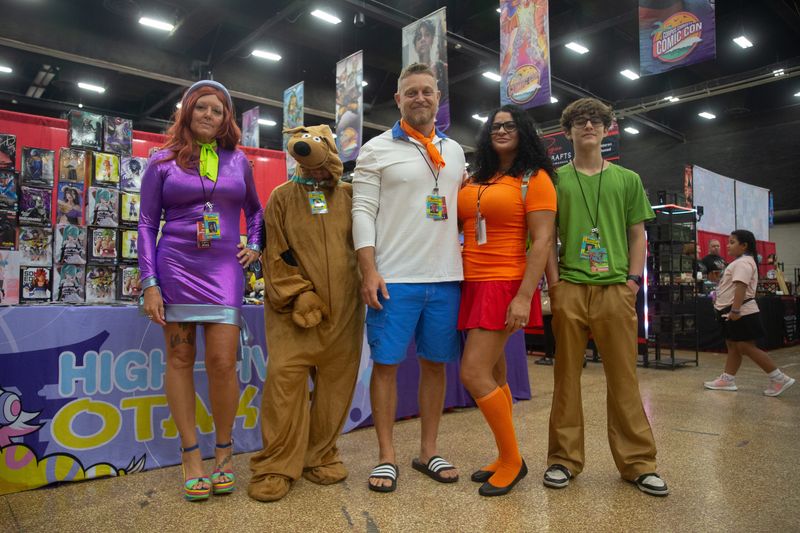 From left, April Shumate, Priscilla Tarpley, Sam Schultz, Pam Schultz and Samuel Schultz Jr. pose for a photo at the Corpus Christi Multiverse at the Hilliard Center in Corpus Christi, Texas, on June 6, 2026. The five were dressed as characters from the cartoon series "Scooby-Doo."