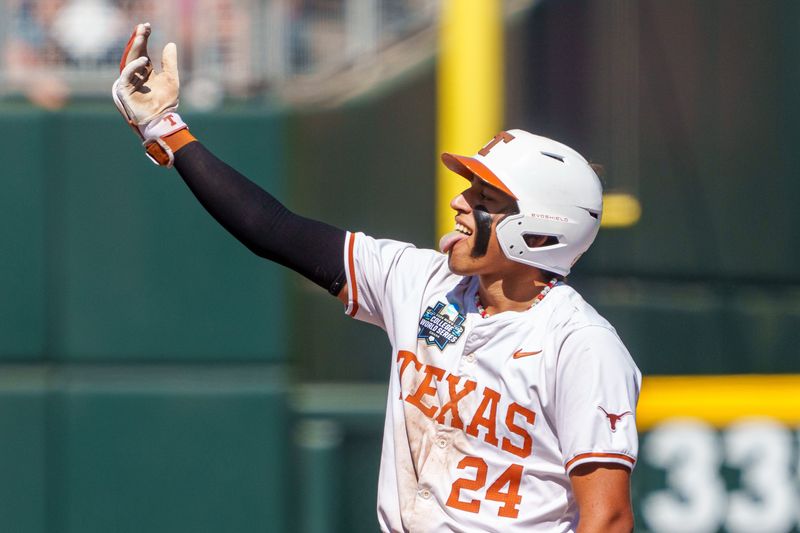 Jun 14, 2026; Omaha, NE, USA; Texas Longhorns shortstop Adrian Rodriguez (24) celebrates after driving in a run on a double against the Alabama Crimson Tide during the eighth inning at Charles Schwab Field. Rodriguez became the third person in series history to complete the cycle. Mandatory Credit: Dylan Widger-Imagn Images