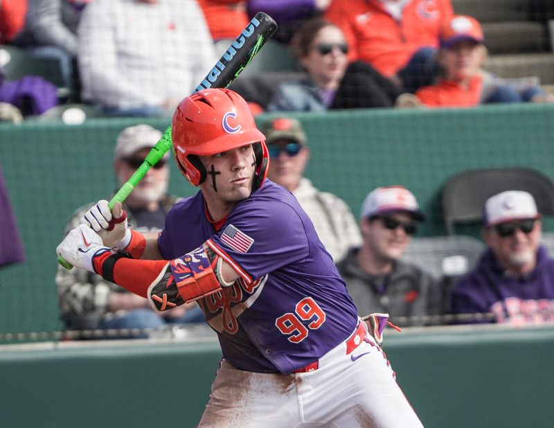 Clemson catcher Nate Savoie (99) bats against Army West Point during the bottom of the third inning at Doug Kingsmore Stadium in Clemson, S.C. Saturday, Feb 14, 2026.