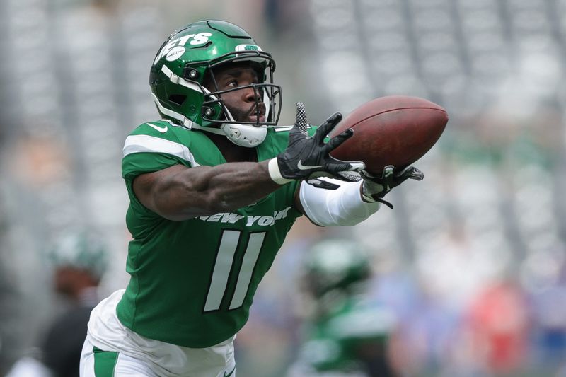 Aug 28, 2022; East Rutherford, New Jersey, USA; New York Jets wide receiver Denzel Mims (11) catches the ball before the game against the New York Giants at MetLife Stadium. Mandatory Credit: Vincent Carchietta-USA TODAY Sports