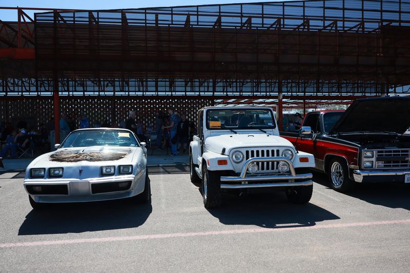 The Together We Rebuild Community Car Show was held June 7 at Arts in the Sunset in Amarillo to raise funds for those impacted by recent fires. Rick Sprouse and his wife each entered a car into the show, her white Jeep and his 1979 model Pontiac Trans Am.