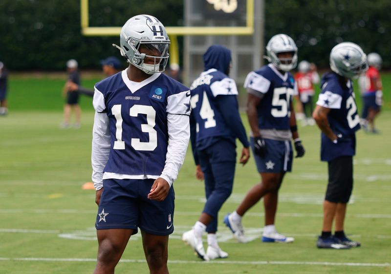 Jun 16, 2026; Dallas, TX, USA;  Dallas Cowboys safety Caleb Downs (13) goes through a drill during practice at the Ford Center at the Star Training Facility in Frisco, Texas. Mandatory Credit: Chris Jones-Imagn Images