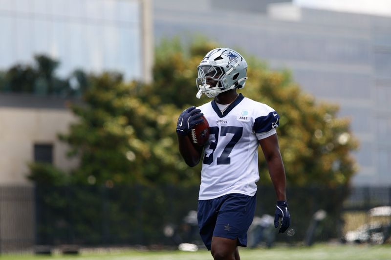 Jun 16, 2026; Dallas, TX, USA;  Dallas Cowboys running back Phil Mafah (37) goes through a drill during practice at the Ford Center at the Star Training Facility in Frisco, Texas. Mandatory Credit: Chris Jones-Imagn Images