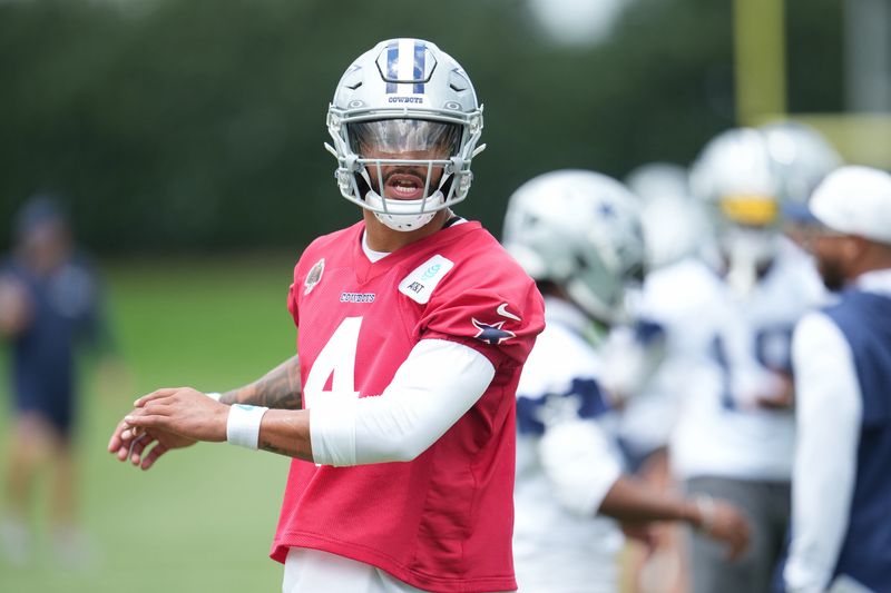 Jun 16, 2026; Dallas, TX, USA;  Dallas Cowboys quarterback Dak Prescott (4) goes through a drill during practice at the Ford Center at the Star Training Facility in Frisco, Texas. Mandatory Credit: Chris Jones-Imagn Images