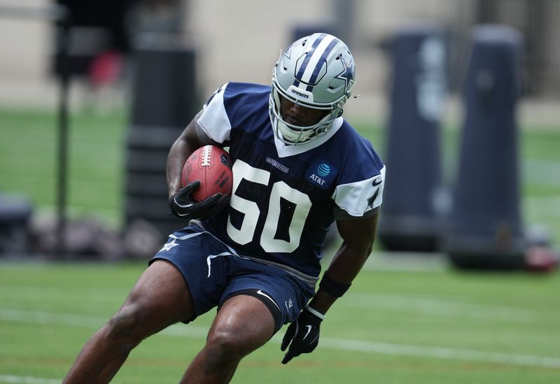 Jun 16, 2026; Dallas, TX, USA;  Dallas Cowboys linebacker Shemar James (50) goes through a drill during practice at the Ford Center at the Star Training Facility in Frisco, Texas. Mandatory Credit: Chris Jones-Imagn Images