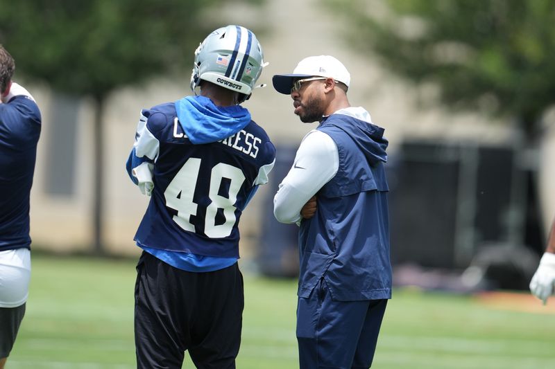 Jun 16, 2026; Dallas, TX, USA;  Dallas Cowboys defensive coordinator Christian Parker speaks with cornerback Zion Childress (48) during practice at the Ford Center at the Star Training Facility in Frisco, Texas. Mandatory Credit: Chris Jones-Imagn Images
