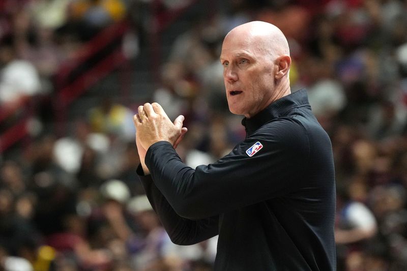 Jul 12, 2025; Las Vegas, NV, USA;  Charlotte Hornets head coach Chris Jent looks on against the Philadelphia 76ers in the fourth quarter of their game at Thomas & Mack Center. Mandatory Credit: Candice Ward-Imagn Images