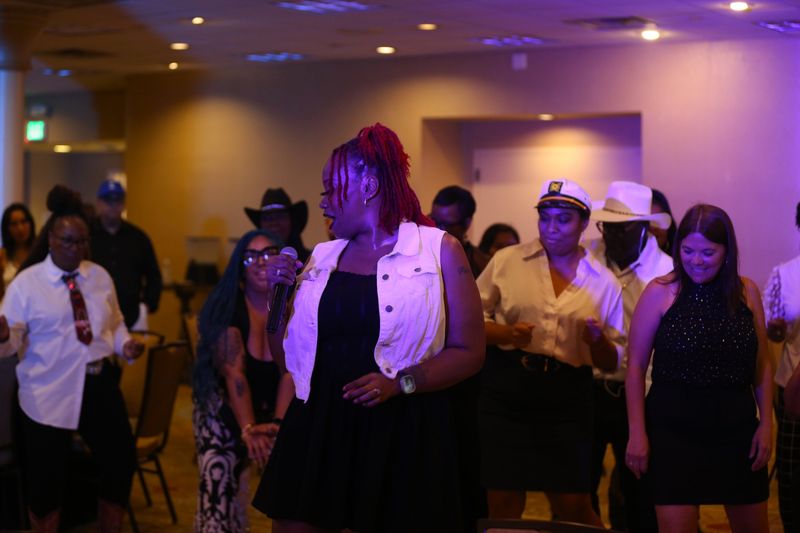 Kimberly Tanner, center, teaches attendants a line dance at the Liberation After Dark dance, hosted by the Texas Association of Black Personnel in Higher Education, on June 19, 2026. The dance was among planned events in celebration of Juneteenth.